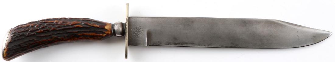LATE 1800S ENGLISH SHEFFIELD STAG BOWIE KNIFE: Late 1800s Rodgers Sheffield bowie knife with stag handle and sterling silver pommel and beginning of handle. Marked "Rodgers Sheffield" on ricasso and Sterling on silver parts. Excellent blade in gre