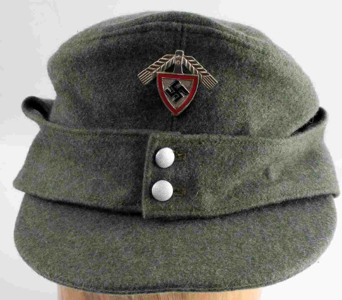 WWII GERMAN THIRD REICH M 43 RAD EM CAP: German RAD Labor Corps M1943 type helmet. Green wool construction with aluminum cap badge. Cap marked on interior, however time and fading have left it indicernable. Reverse of cap badge marked "Ges G