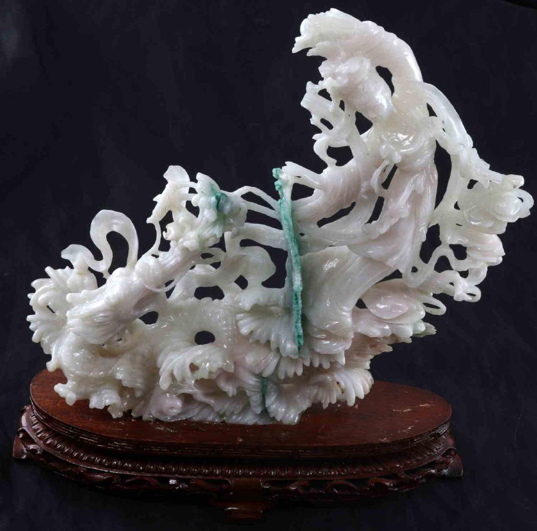 CHINESE WHITE GREEN JADE SCULPTURE WOMAN DRAGON: Vintage Chinese nephrite jade sculpture. Made of a white and green colored jade. Hand carved image of a young woman and a dragon. Measures 10 inches high by 8 inches wide. In very good condition.