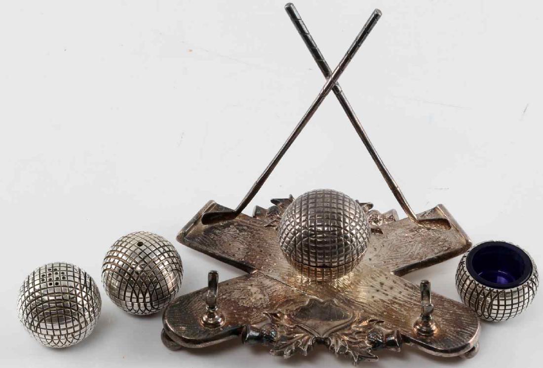 VINTAGE GOLF BALL DESK SET SALT PEPPER SHAKER LOT: Lot contains a golf ball pen rest and ink well, a golf ball salt and pepper shaker and a salt cellar. All in very good condition. Desk set measures approximately 6x4x5 inches and each of the other pie