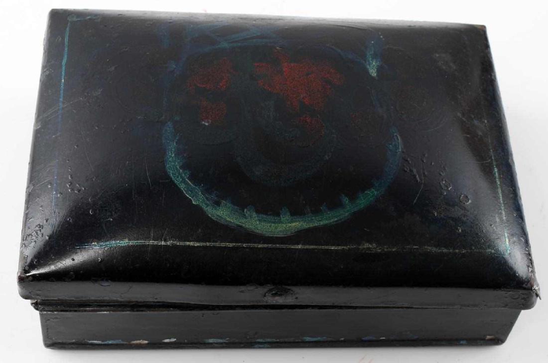 ANTIQUE BLACK METAL PAINTED SPICE BOX: Inside has two lids that cover three compartments each. Top is marked "CINNAMON MACE CLOVES" and bottom is marked "NUTMEG ALLSPICE GINGER" Top is painted with a floral design. Box measures approximate