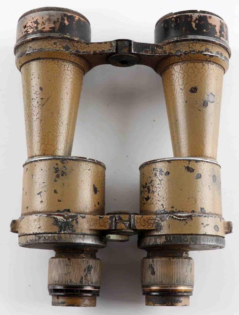 GERMAN HUET PARIS MADE DIENSTGLAS BINOCULARS: Set of 7X50 binoculars manufactured by Huet Paris and marked Dienstglas underneath suggesting German military use. Retains most of its original tan coloration. In fair condition. Left-side eyepiece ap