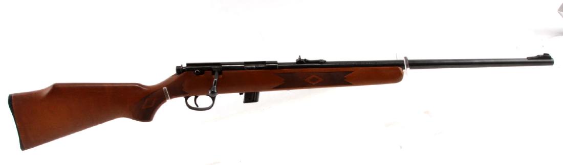 MARLIN MODEL 25N BOLT ACTION RIFLE .22 LR MICRO: 1966 production. Micro-groove 22 inch blued steel (75%) barrel with good clear bore, clear markings, fixed front and dovetail rear sight, wood butt, 10 rd magazine included. Requires FFL or C&R for tr