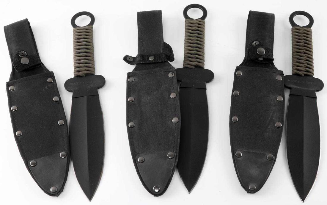 LOT OF 3 SHANGHAI SHADOW THROWING FIGHTING KNIVES: Lot of 3 Shanghai Shadow Throwing / Fighting knives marked "SHANGHAI SHADOW" & Cold Steel China on the reverse. Each knife measures inches long and is complete with rope handle & scabbard.