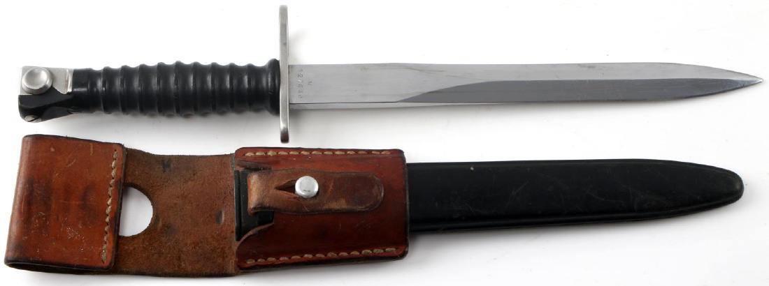 SIG SWISS ARMY ISSUE BAYONET WITH FROG & SCABARD: Sig swiss Army Issue bayonet with scabbard & brown leather frog , marked on reverse with Swedish army cartouche and cross, as well as "76" numerical marking. In good condition with no signs of damage 