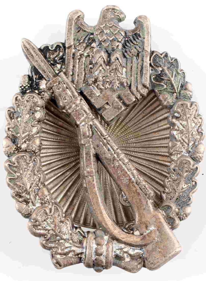 WWII GERMAN THIRD REICH INFANTRY ASSAULT BADGE: German Infantry Assault badge. Reichsadler atop Mauser inside of oak wreath. Solid back 1-piece construction with screw back pin. Badge seems to have been converted from vertical pin to screw-back. Th
