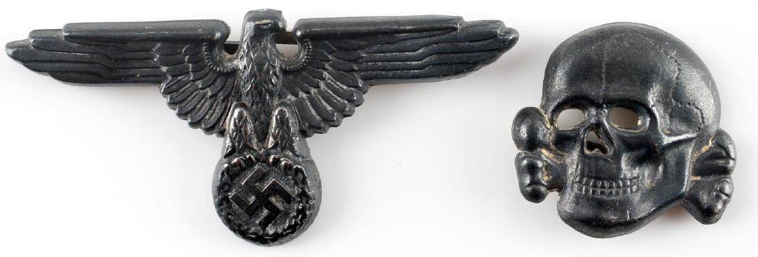 WWII GERMAN THIRD REICH SS TOTENKOPF SKULL & EAGLE: German SS Skull & Eagle for visor cap. Both badges are have identical RZM "M1/52" marks at their reverse. Aluminum construction. Badges painted black for unknown reason. Unauthenticated; sold as is.