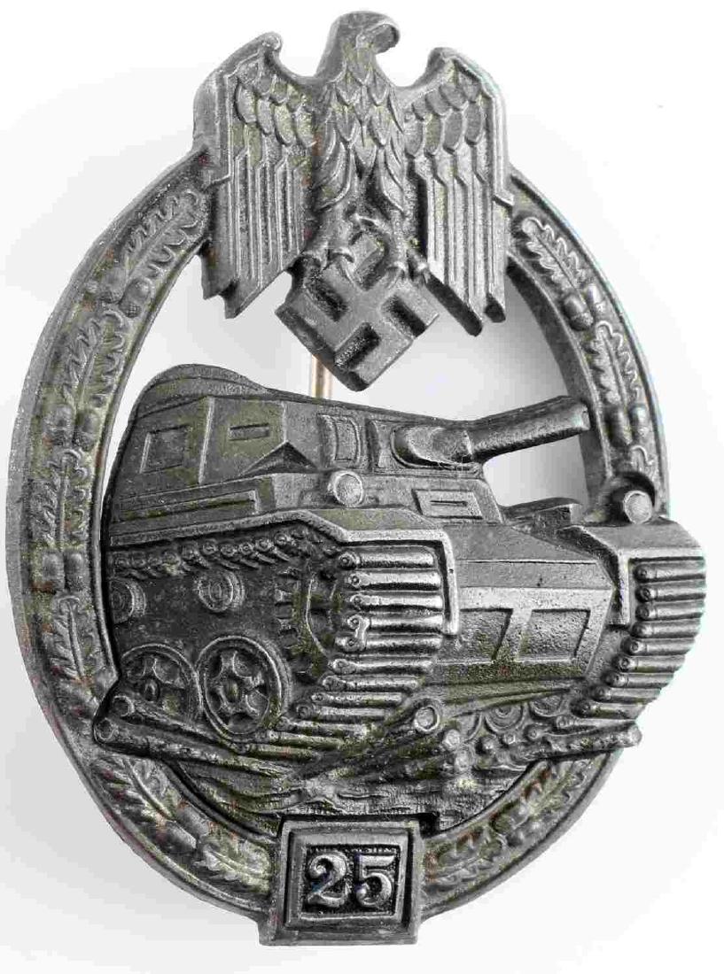 WWII GERMAN PANZER ASSAULT BADGE 25 ACTIONS: WWII German Panzer Assault badge with 25 action. 2 piece rivet construction with thin wire type back pin. Reverse marked "G B." Good condition overall. Some signs of abrasions and discoloration presen