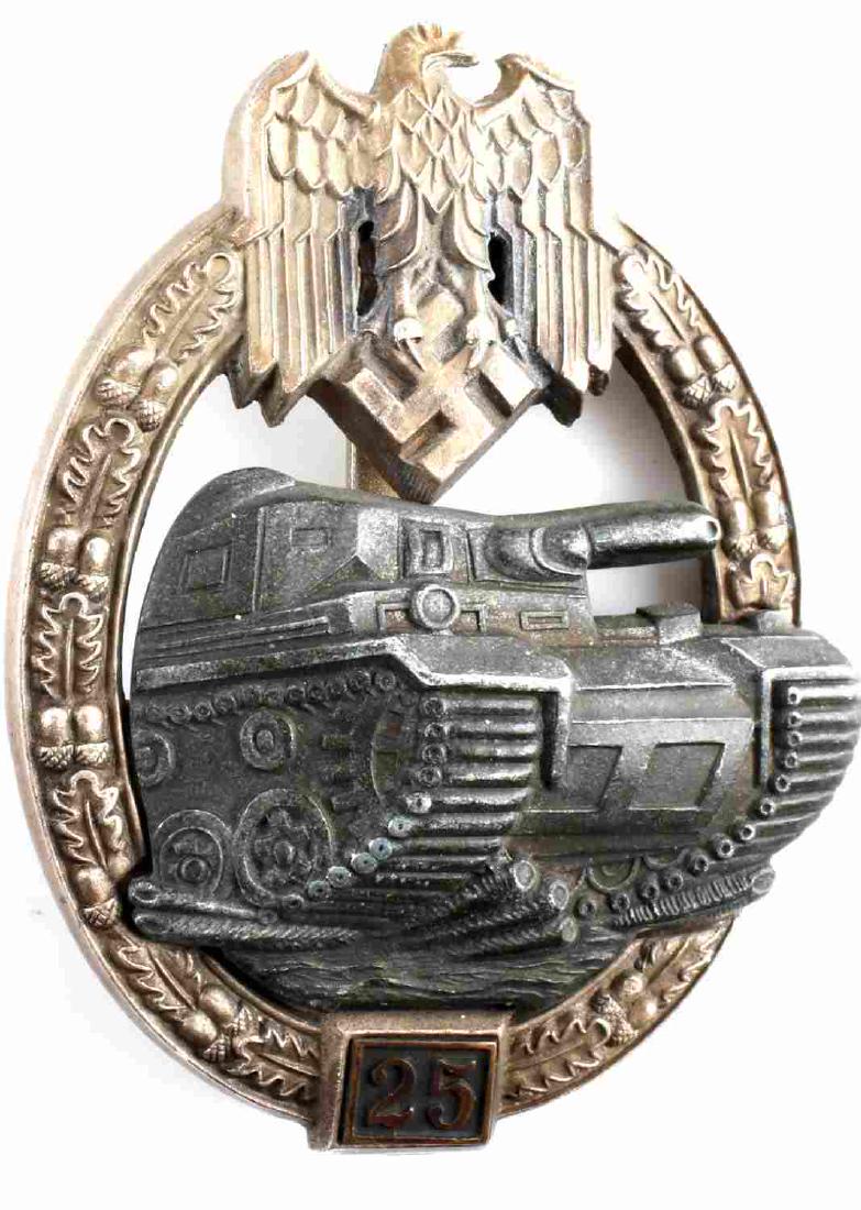 WWII GERMAN PANZER ASSAULT BADGE 25 ACTIONS: WWII German Panzer Assault badge with 25 action. 2 piece rivet construction with vertical back pin. Good condition overall. Some signs of abrasions and discoloration present. Unauthenticated; sold as 