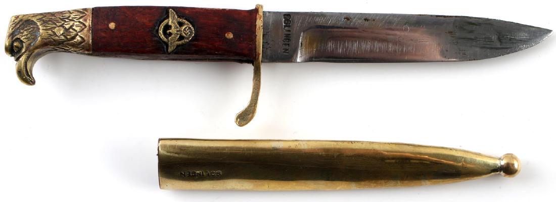 WWII GERMAN THIRD REICH POLICE MINI DRESS BAYONET: Miniature Third Reich Police dress bayonet. Has "Solingen" on the blade and scabbard. In very good condition. Unauthenticated/Sold 'as is' This lot has a reserve.