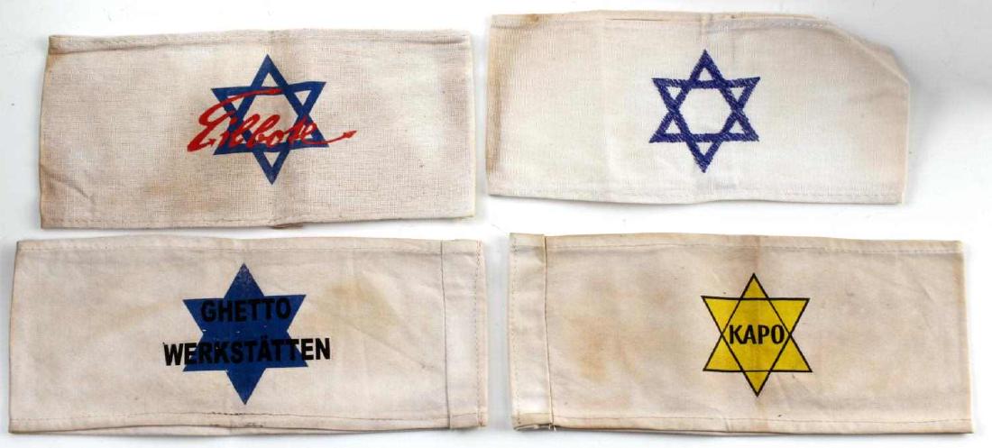 WWII GERMAN JEWISH GHETTO ARMBAND LOT OF 4: Jewish ghetto/camp armband lot of 4. Includes Ghetto workshop armband, a Kapo armband, and more. Very good condition with some staining and fading present. Unauthenticated; sold as is. This lot has a 