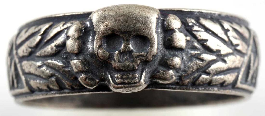 WWII GERMAN THIRD REICH SS HONOR RING: SS Honor ring. 1938 date inside along with name of recipient and signature of Himmler. Tests silver content, weighs 9.1 grams. In good condition. Unauthenticated/Sold 'as is' This lot has a reserve.