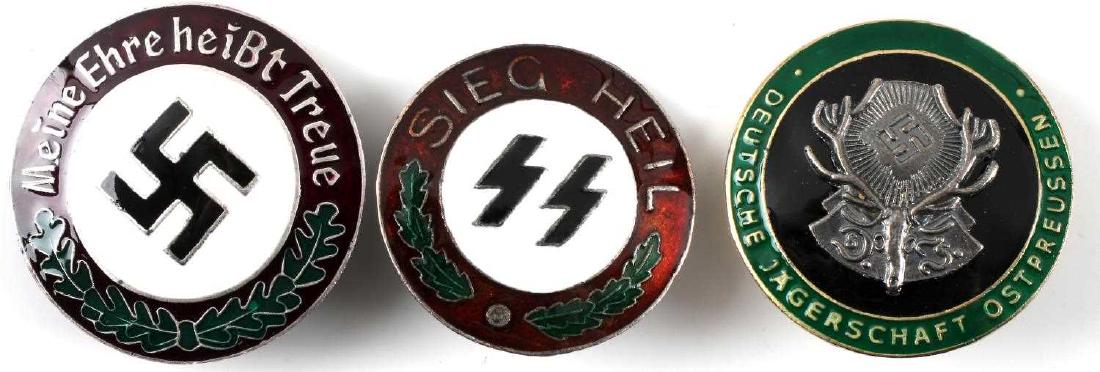 WWII GERMAN SS & HUNTING ASSOCIATION BADGE LOT: This lot includes 1 German SS Meine Ehre heisst Treue badge, 1 NSDAP "Sieg Heil" badge, and 1 German hunting association badge. Badges are screw-back versions. Each badge is reverse RZM and double S s