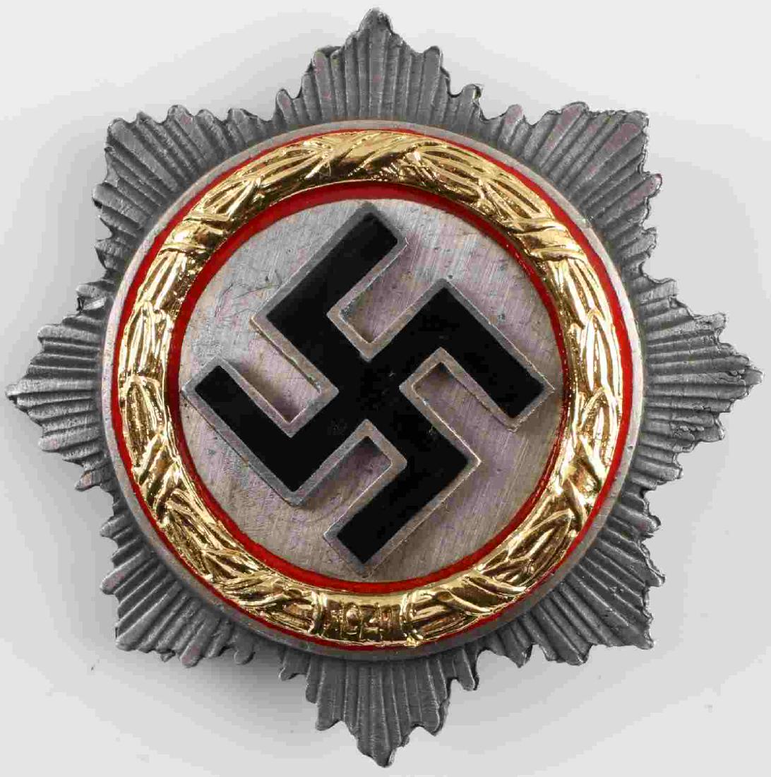 WWII THIRD REICH GERMAN CROSS IN GOLD DECORATION: Gold edition German Cross award. In very good condition. Has Brehmer maker mark on the back. Unauthenticated/Sold 'as is' This lot has a reserve.