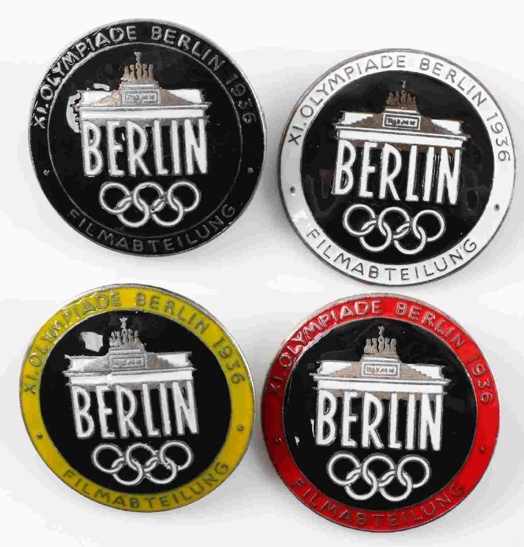 GERMAN THIRD REICH 1936 BERLIN OLYMPICS BADGE LOT: Lot contains 4 badges from the 1936 Olympics. Each has RZM or maker marks. Two are screwback and two are pin back. This lot has a reserve.