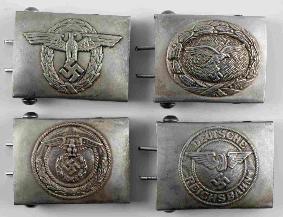 WWII GERMAN THIRD REICH BELT BUCKLE LOT OF 4: Lot contains 4 German belt buckles. Includes Luftwaffe, SA, Deutche Reichsbahn, and SS police. Each has an RZM mark on the catch. In very good condition. Unauthenticated/Sold 'as is' This lot has a re