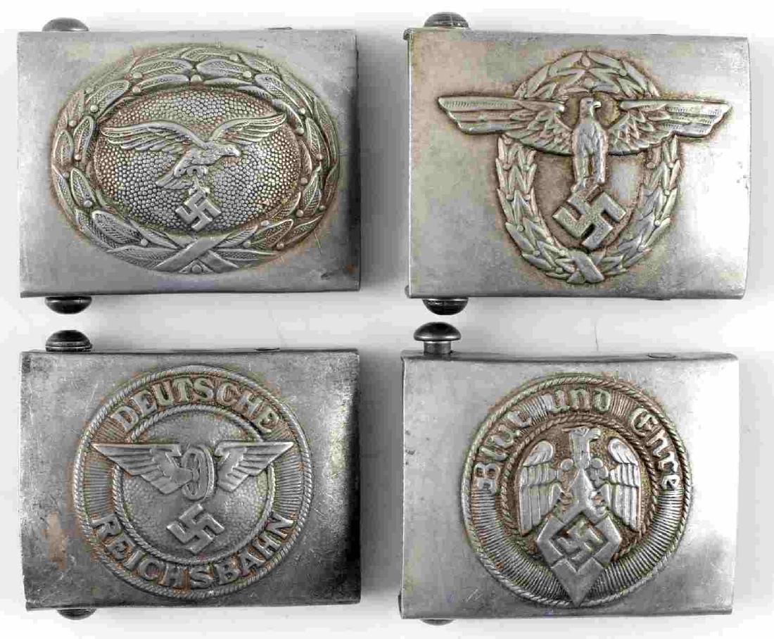 WWII GERMAN THIRD REICH BELT BUCKLE LOT OF FOUR: Lot of four German belt buckles. Includes Luftwaffe, Police, Deutsche Reichsbahn, and Hitler Youth. In very good condition. Unauthenticated/Sold 'as is' This lot has a reserve.