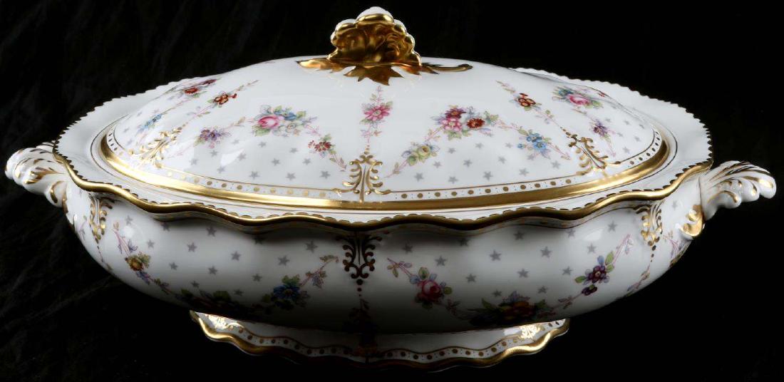 ROYAL CROWN DERBY ANTOINETTE COVERED VEGETABLE: English white bone china with gold accent and floral pattern, 'Royal Antoinette', measures 14 X 8 X 5.5 inches. Both pieces are maker marked. Very good condition. No chips, cracks, or repairs.