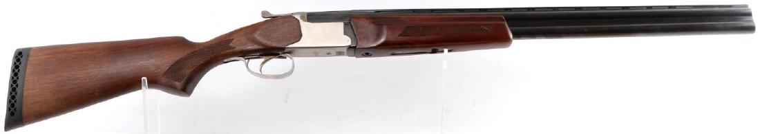 RUSSIAN REMINGTON SPR 310 OVER UNDER 12 GA SHOTGUN: Blued steel retains 70% original finish, silver tone receiver, and fine wood stock. Chambered for 2 3/4 or 3 inch shells. Barrels measure 26.75 inches long with bright clean bores. Maker marked to lef