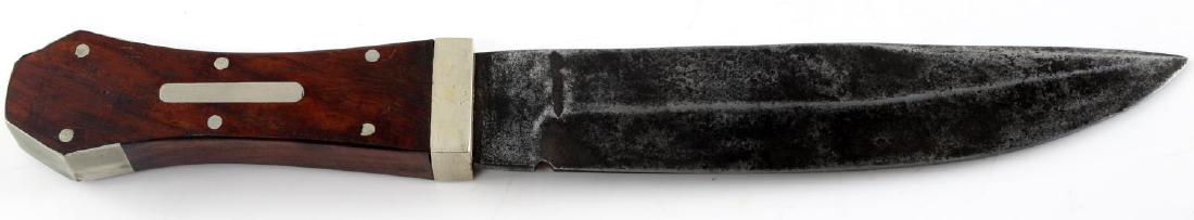 CIVIL WAR SHEFFIELD MARKED FIGHTING KNIFE 5TH GA: Civil War era Sheffield marked fighting knife with weighted un-fullered drop point blade, cross guard locket bears a marking that reads " 5th GA " . Patination is visible on blade.