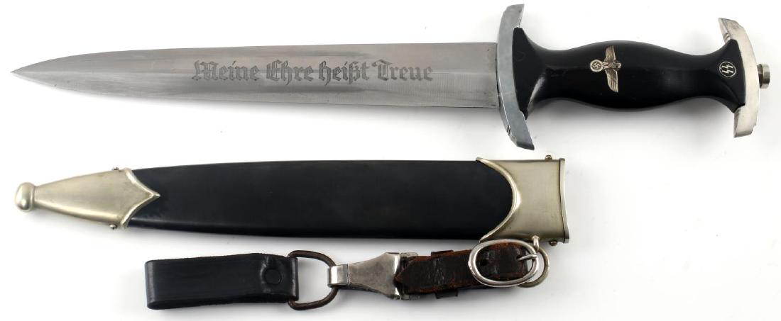 WWII GERMAN THIRD REICH SS M33 DAGGER HERDER MADE: M33 Herder-made SS dress dagger. Has all nickel fittings. Single "I" mark on the crossguard. Single leather hanger with RZM markings. In very good condition overall with expected age wear.