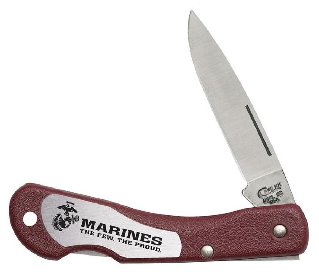CASE XX USMC RED SYNTHETIC MINI BLACKHORN KNIFE: CASE XX USMC RED SYNTHETIC MINI BLACKHORN KNIFE. Brand new in box Case XX manufactured knife, Official Licensed product of the US Marine Corps. This lot has a reserve.
