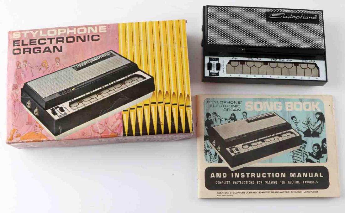 STYLOPHONE ELECTRONIC ORGAN IN BOX W SONG BOOK: Stylophone Electronic Organ in Box with Song Book. Very nice condition.