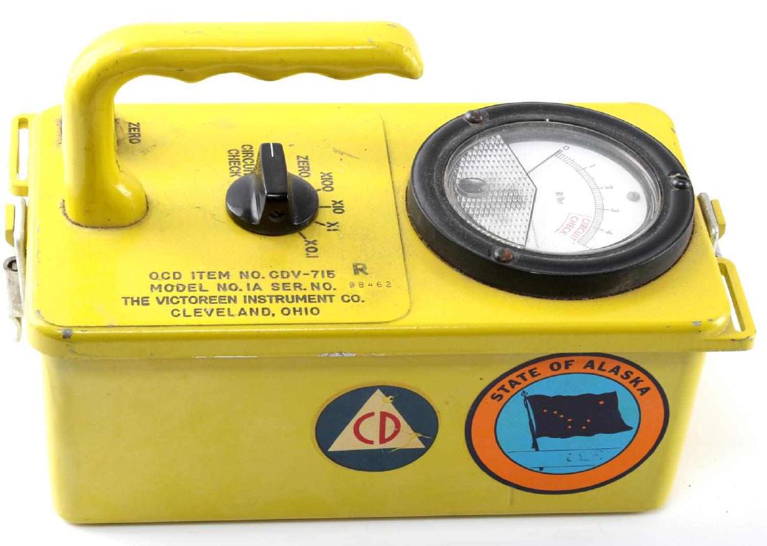 US COLD WAR ALASKA CIVIL DEFENSE GEIGER COUNTER: 1970s vintage Victoreen made Geiger counter with stickers for Civil Defense and the state of Alaska. In very good condition with minor paint wear. Has not been tested for functionality.