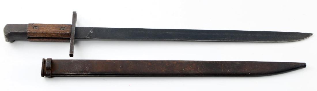 WWII IMPERIAL JAPANESE ARISAKA BAYONET W/ SCABBARD: WWII Japanese Arisaka bayonet. Straight quillion version with Hikari Seiki Seisakusho arsenal marks on its ricasso. Also marked 3697 on its pommel. Good service condition. Some abrasions and wear pres
