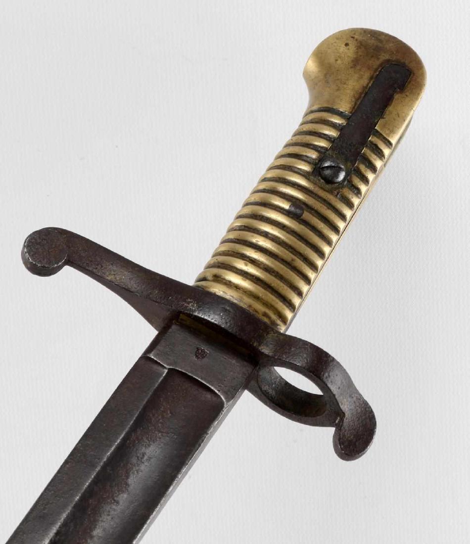 GERMAN MADE S & K CIVIL WAR SABER BAYONET: German Schitzler & Kirscbaum made bayonet for use on Brazilian Naval Rifle and American Model 1855 Colt Revolving Artillery Carbine. Marked S & K and with what appears to be an anchor on its ricasso. 