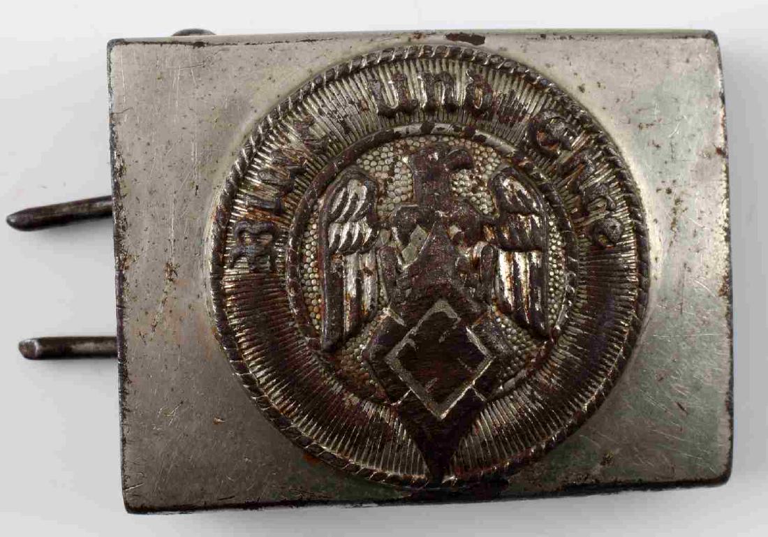 WWII GERMAN THIRD REICH HITLER YOUTH BELT BUCKLE: German 1936 pattern Hitler Youth belt buckle. Metal construction, RZM marked "M/127" on reverse. Some surface rust and detail loss present. Fair overall. Good authentic piece.