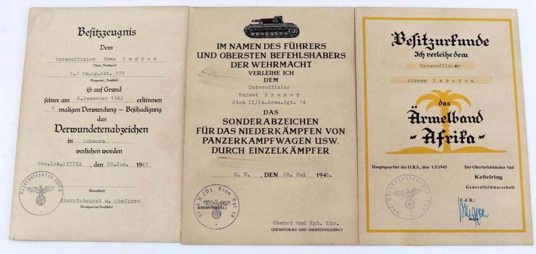 LOT OF 3 WWII GERMAN AWARD DOCUMENTS WOUND BADGE: 3 German award documents: Wound badge in black, Armelband Africa, and Panzer honor cord. Each measures just under 8 by 5.5 inches. Very good condition. Unauthenticated, sold as is. This lot has a rese