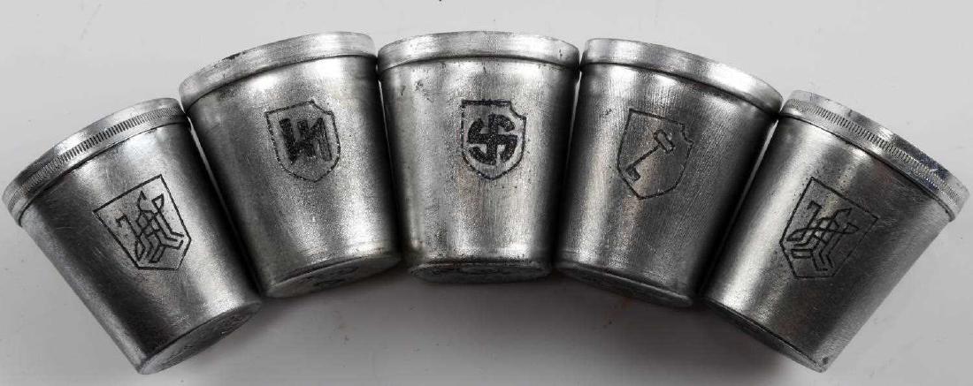 WWII GERMAN THIRD REICH WAFFEN SS SCHAPPS CUP LOT: Group of 5 SS schnapps cups with division insignia logos at their front. Includes Adolf Hitler division, Viking division, 2nd Panzer Das Reich, and more. Good condition overall. Some wear and signs of