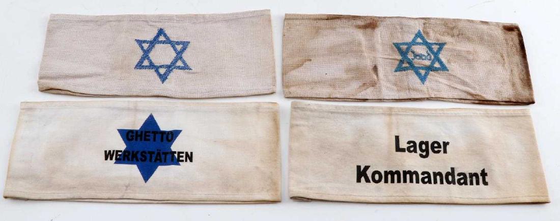 WWII GERMAN JEWISH GHETTO ARMBAND LOT OF 4: This lot features 4 Jewish ghetto armbands including 1 Ghetto workshop and Lagerkommandant versions. Good condition overall. Some staining present. Unauthenticated; sold as is. This lot has a reserve.