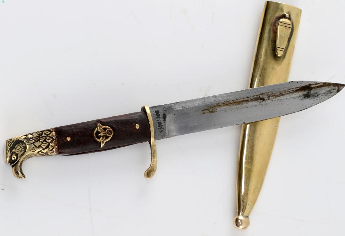 WWII GERMAN THIRD REICH MINIATURE POLICE BAYONET: German miniature police bayonet. Has Solingen marked blade, wooden handle, and gold colored scabbard. Good condition overall. Some corrosion and surface rust present. Measures 6.5" in length. Unauthen