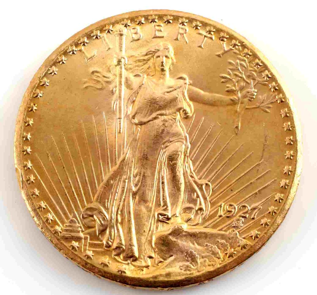 1927 SAINT GAUDENS DOUBLE EAGLE $20 GOLD COIN: St Gaudens $20 Gold Double Eagle coin dated 1927. In condition consistent with MS63. Full mint luster and good brilliance. Surface has some minor bag marks and has generally very good eye appeal. Meta