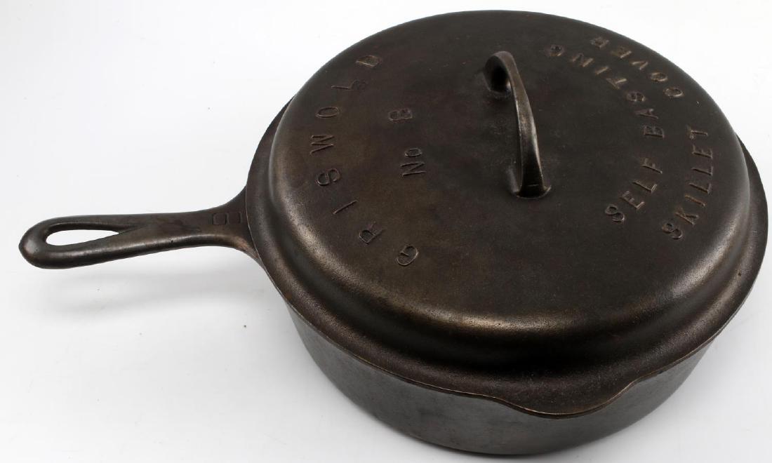 GRISWOLD NO 8 1922 1048 LID 777 CAST IRON SKILLET: Under lid has Erie Pa. patent date 1922, and 1048, 777 on base and raised letters on lid, very good near unused condition. measures 12 by 4 1/2 inches excluding handle.