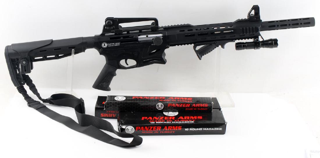 AR-12 SEMI AUTO PANZER ARMS 12 GAUGE SHOTGUN: New in box AR-12 Pro Panzer Arms semi-automatic 12 gauge shotgun. Butt stock has a built in recoil pad with an ergonomic pistol grip. Flat top receiver with a full weaver rail . Forearm has a great fu