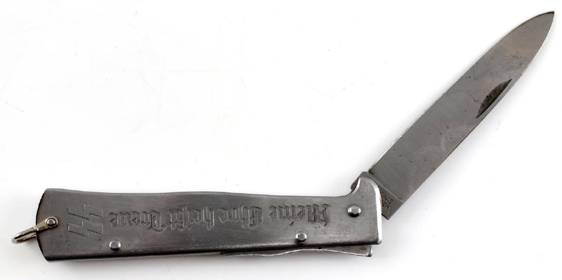 WWII GERMAN THIRD REICH SS FOLDING POCKET KNIFE: SS marked pocket knife manufactured by R Klass of Solingen. Has R. Klass kissing storks and name on ricasso, with "D.R.G.M." on the other. One side of the handle has "Meine Ehre Heisst Treue" with SS