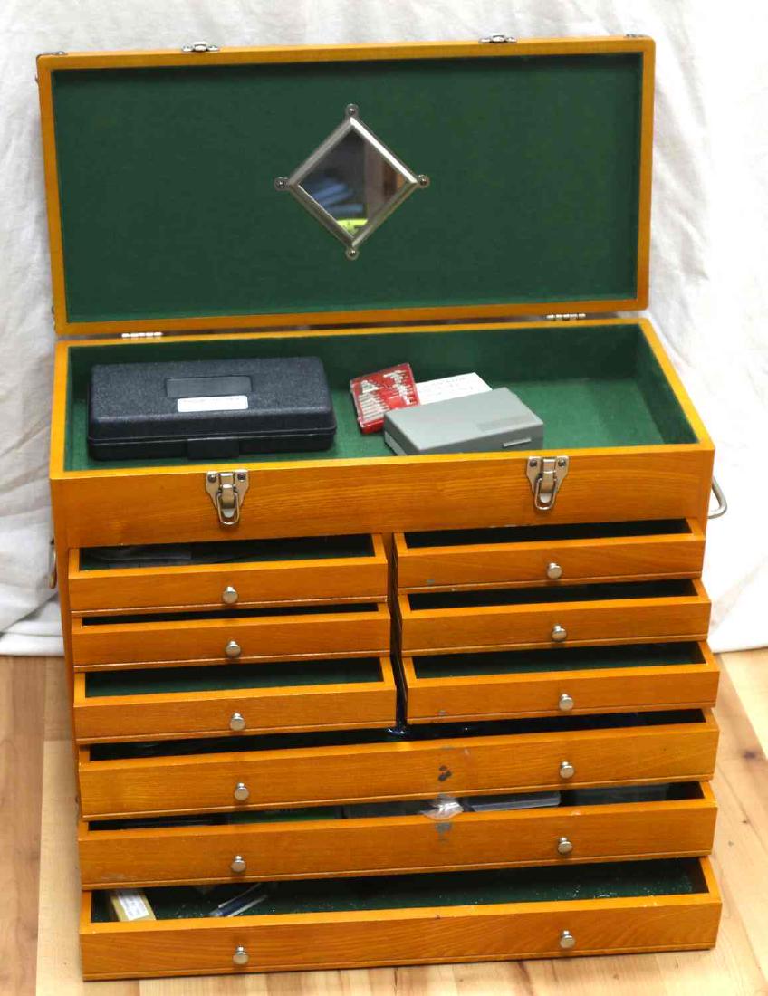 9 DRAWER WINDSOR WOOD TOOL BOX WITH TOOLS: Very good condition has assorted metal working tools, measures 24 b7 10.5 by 18 inches.