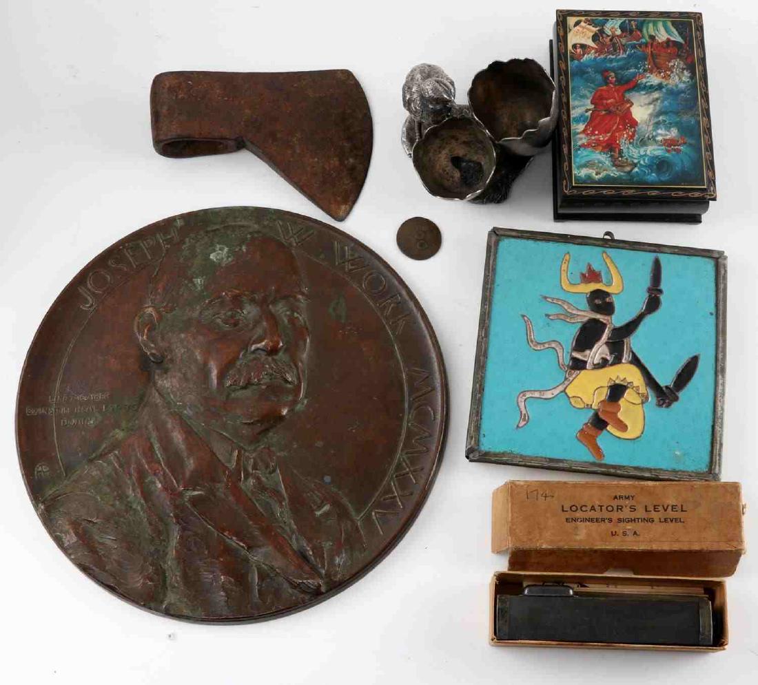 MIXED LOT OF COLLECTIBLES MISCELLANEOUS ITEMS: Mixed lot includes: Spaulding Moss Co. Army locator's level (broken), 1854 target coin, trinket box, ax head, silver plate bird trinket holder, Joseph W. Work bronze plaque (11 inch), and a warrior da