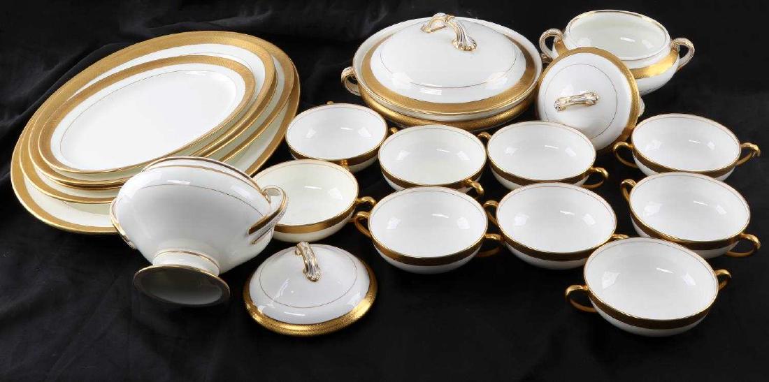 LOT OF MINTON CHINA DINNERWARE PLATTERS 17 PIECE: White Minton china with gold rim and accents, 17 pieces include: 11 inch platter, (2) 13 inch platters, 15.5 inch platter, 17.5 inch platter, lidded vegetable serving dish (9.5 inches wide and 5.5 inc