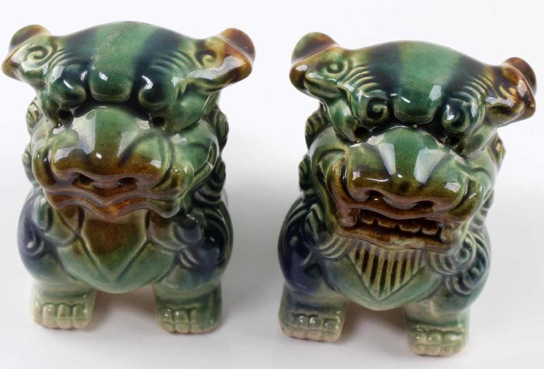 PAIR OF SMALL GLAZED CERAMIC FOO DOGS LION GREEN: Two small foo dogs with colors of blue, green, and brown. Measures 3.5 X 3.5 inches each. Very good condition. Unmarked.