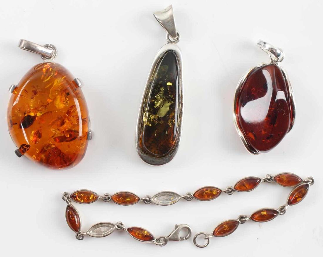 4 PIECES OF ASSORTED SOVIET SILVER & AMBER JEWELRY: Group of four (4). Includes three pendants (approx. 1.25 to 1.75 inches long) and one bracelet (8 inches long). Bracelet is missing two amber stones. Each piece is silver marked. All in good overall c