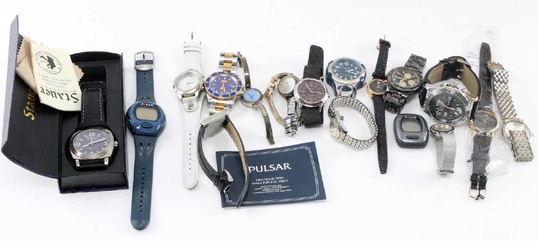 ASSORTED MENS & WOMENS WRIST WATCH LOT OF 19: Lot contains 19 different wristwatches, most of which are mens but some womens. Includes an Automatic Professional Invicta; two Stauers, one in box; two Diamond Quartz watches; two Polars; a Cedar Cre