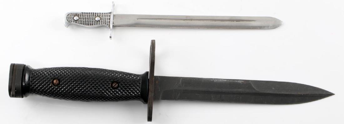 US ARMY M1905 MINIATURE AND M7 BAYONET LOT: Lot contains a miniature M1905 bayonet, likely a letter opener, as well as an unsheathed M7 bayonet. M7 is marked with Ontario maker name. In very good condition overall.