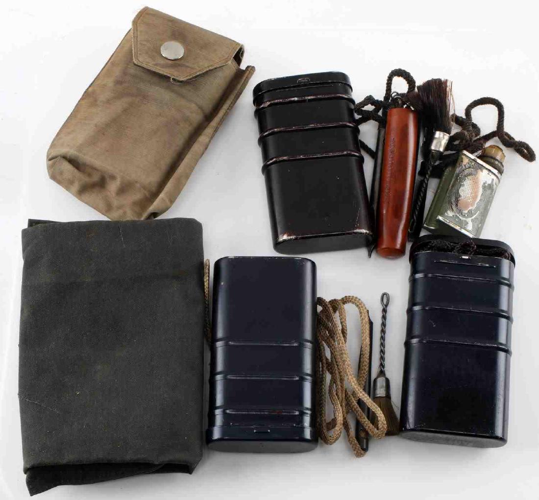 COLD WAR ERA EAST GERMAN RIFLE CLEANING KITS: This lot includes 3 East German rifle cleaning kits. Kits are inside original pouches and are complete. Good condition overall. Some staining and signs of use present.