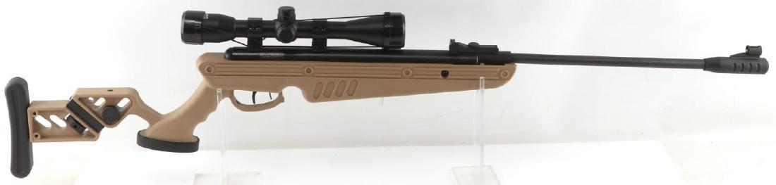 SWISS ARMS TG 1 AIR RIFLE .177 CAL W 4 X 40 SCOPE: Tan and black polymer and steel construction, rifled steel barrel, model, serial number and caliber marked to left side, neon sights, adjustable stock, entire length is 43.5 inches, 4X40 Swiss Arms sc