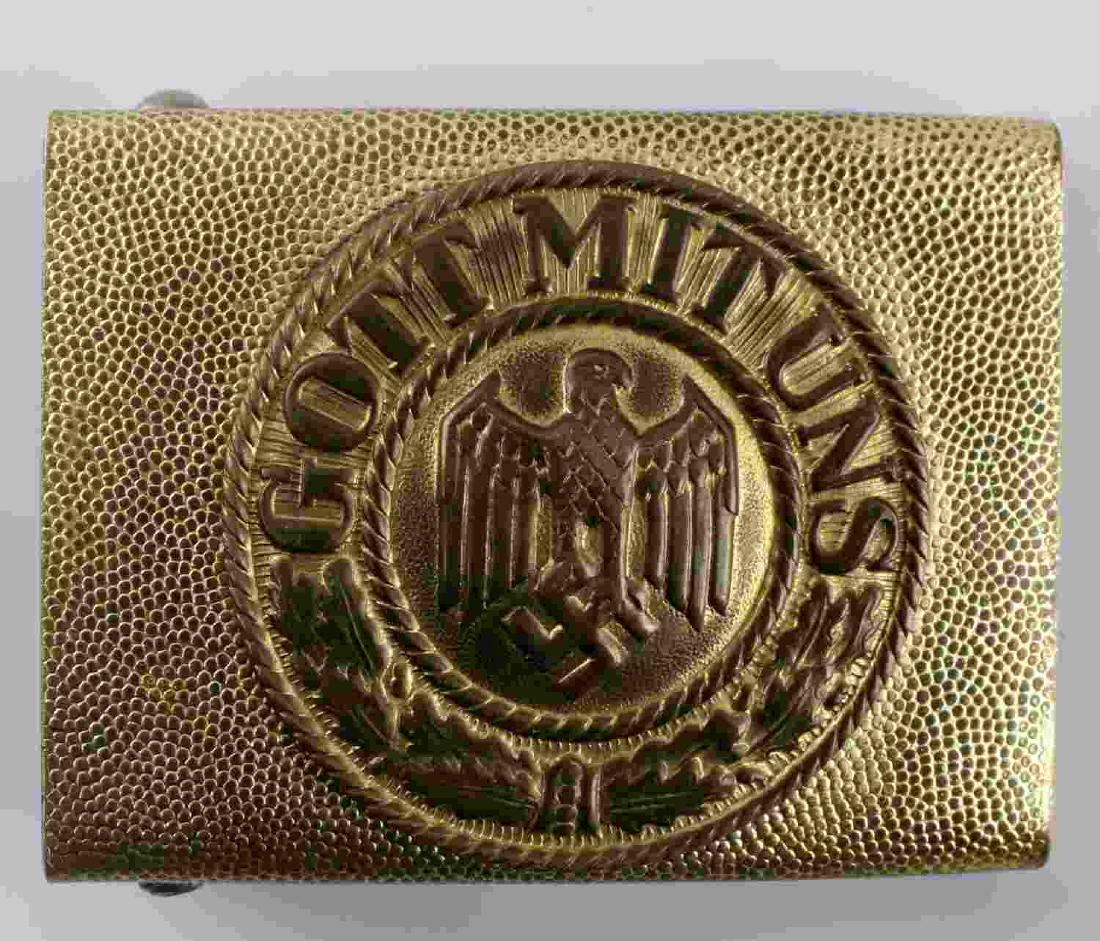 WWII GERMAN THIRD REICH WATER POLICE BELT BUCKLE: German water police belt buckle. "Pebbled" aluminum construction. Reverse maker marked "DRGM". Good condition overall. Some minor paint loss and signs of abrasions present. A small repair also seems t