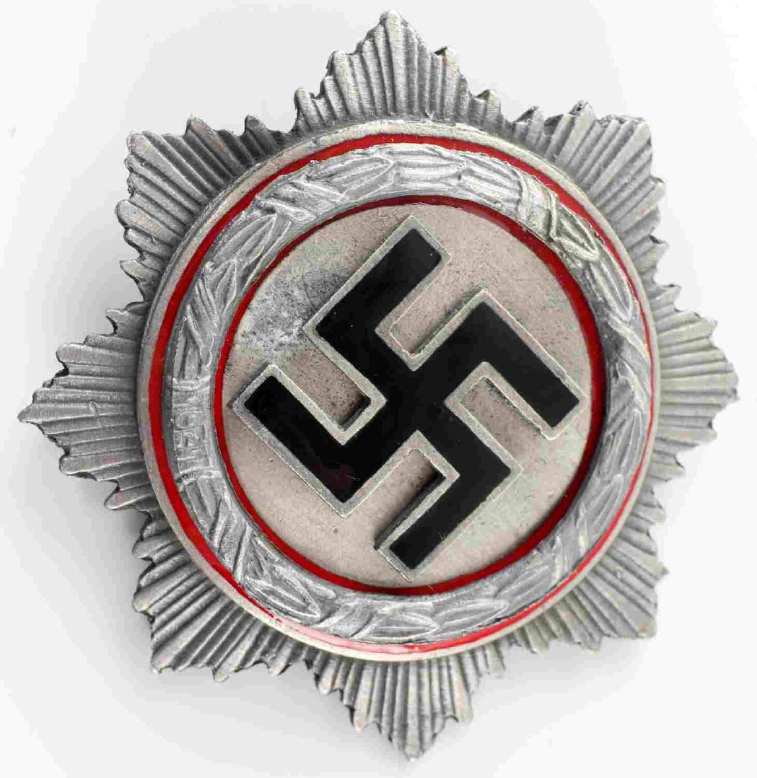 WWII THIRD REICH GERMAN CROSS IN GOLD MEDAL: German Cross in gold. Has G. Brehmer maker mark on the back. In very good condition. Unauthenticated/Sold 'as is' This lot has a reserve.